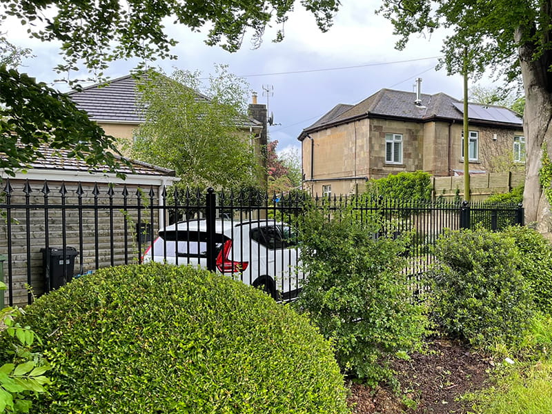 Tall metal front garden fence