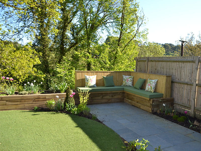Bespoke modern garden design Timber sleepers for raised beds and bespoke bench