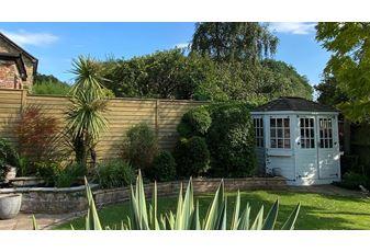 New Privacy Fence Panel Provides Perfect Garden Backdrop