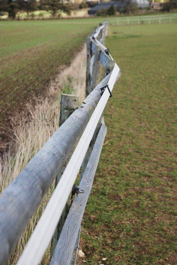 wavering fence caused by rot