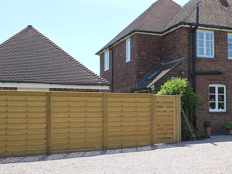 Double sided slatted fence panels