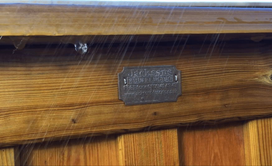 Rain dripping off fence capping rail