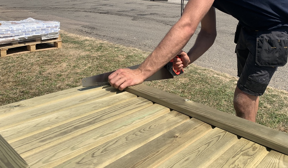 Sawing a fence panel