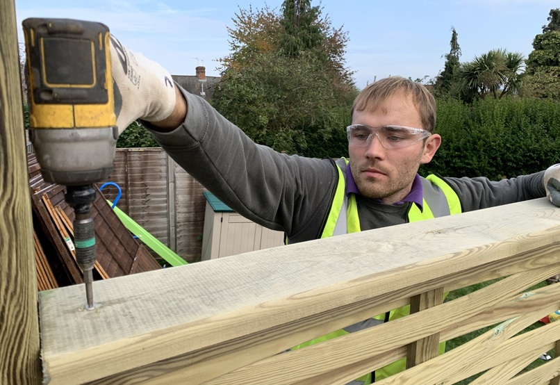 Impact Driver screwing Fence Capping Rail