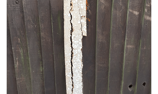 Cracked concrete post