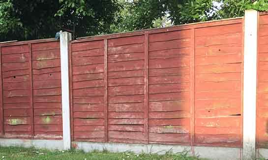 Fence panels in concrete posts