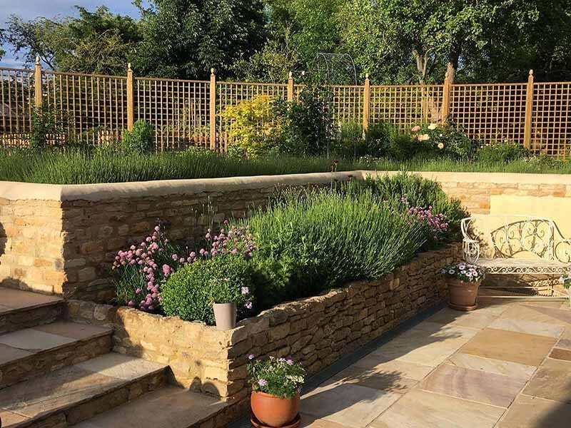 Square trellis panels in garden
