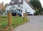 Grass verge timber bollards