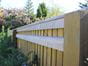 Back of closeboard fencing showing counter rail and capping rail