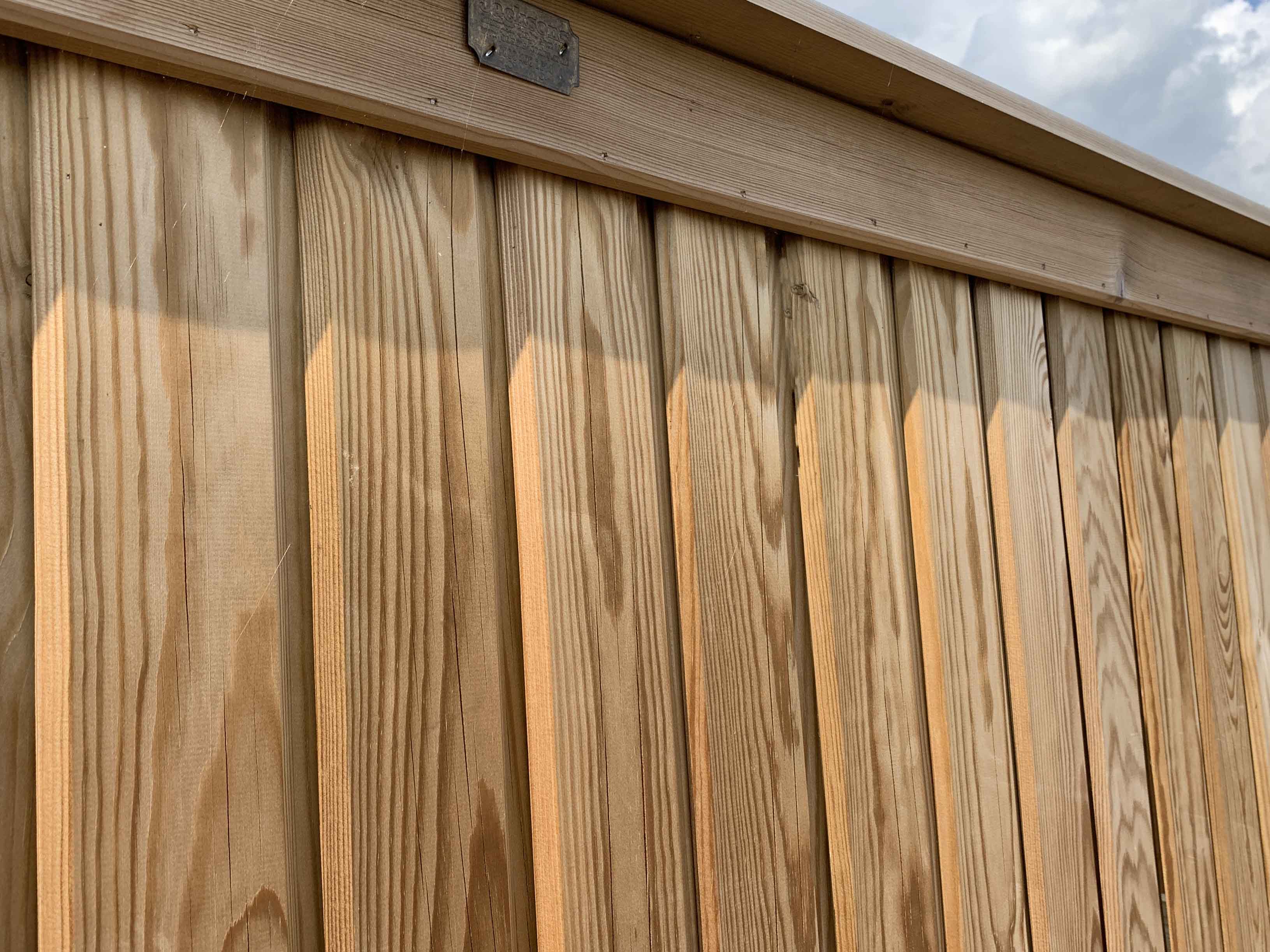 Vertical boarded fence panel