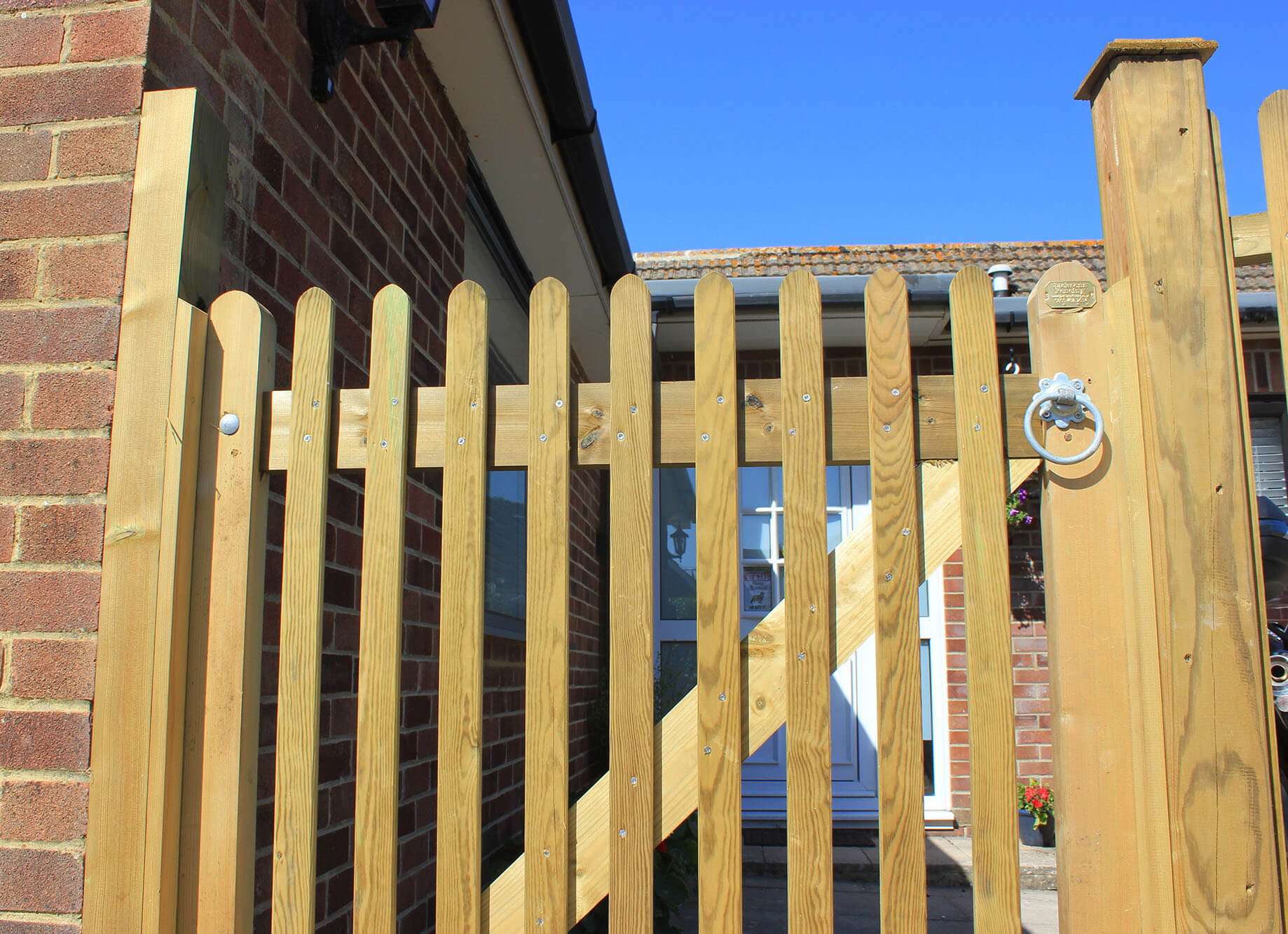 Mitre Topped Wooden Palisade Gates Jacksons Fencing