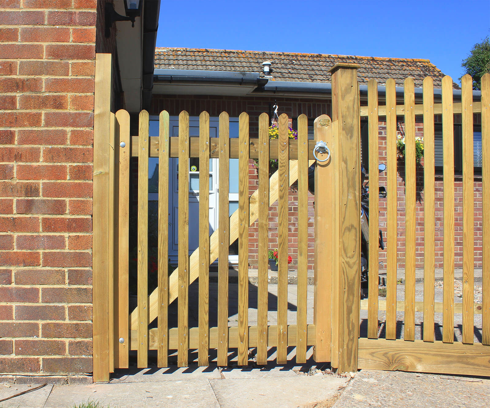 Mitre Topped Wooden Palisade Gates Jacksons Fencing