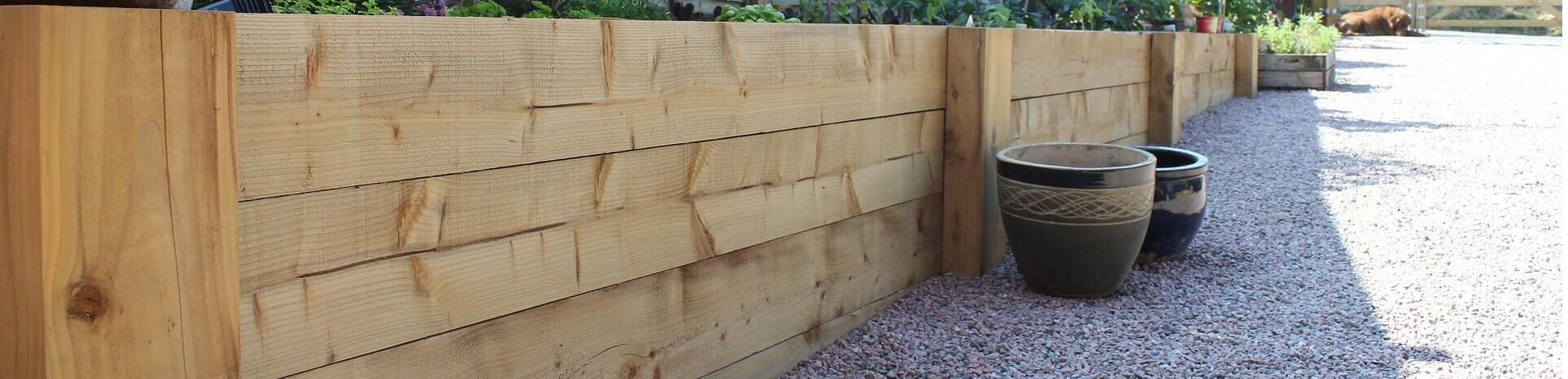 Landscape products wooden sleepers holding plants
